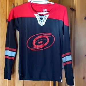 Long sleeve Carolina Hurricanes shirt.